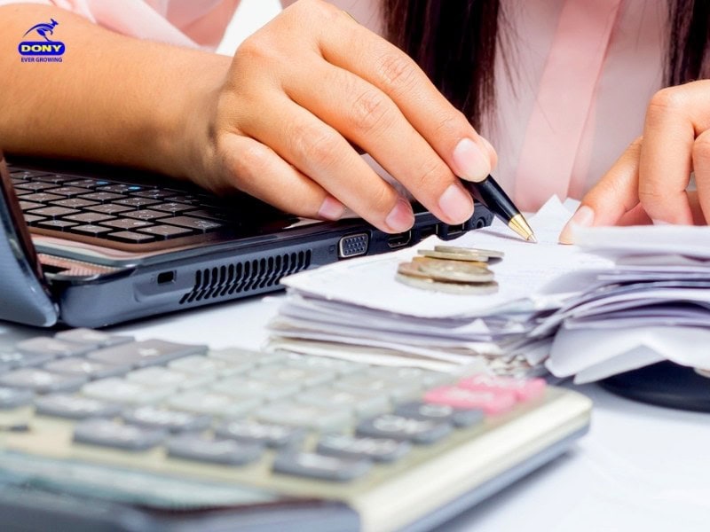 chi phi may do dong phuc