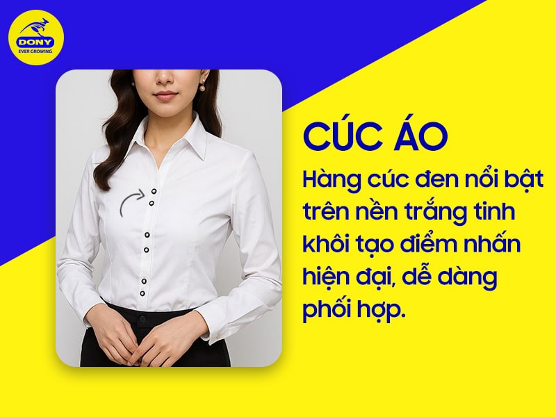Cúc đen nổi bật trên nền áo trắng tinh.