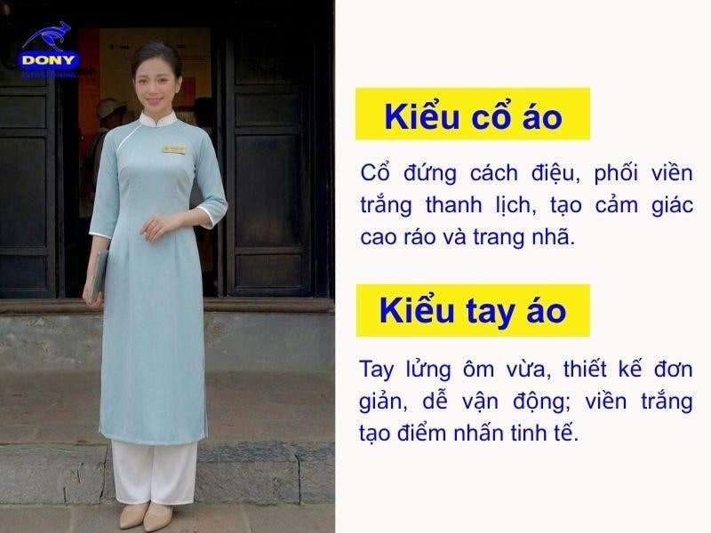 Cổ đứng cách điệu phối viền trắng thanh lịch. Tay lửng ôm vừa