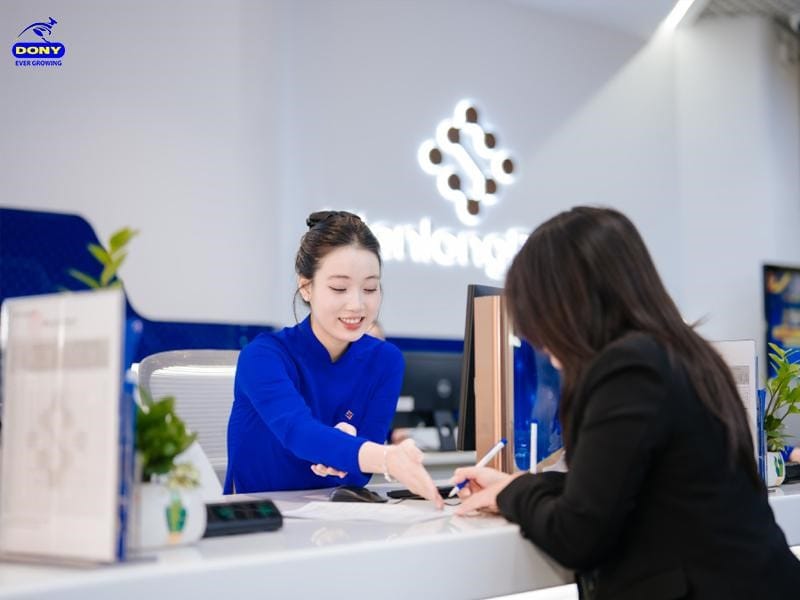 Đồng phục ngân hàng KienlongBank giúp tăng nhận diện thương hiệu.
